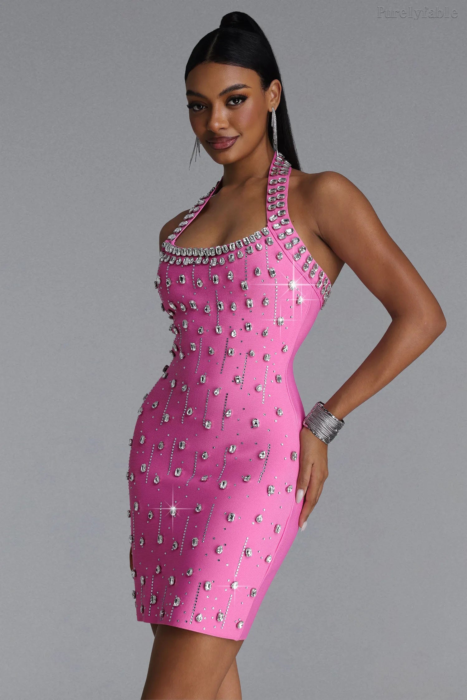 Maeve's pink fitted halter-neck dress